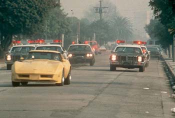 Yellow Corvette chased down